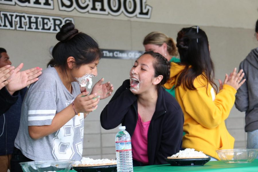 Students Having a blast while eating pie 